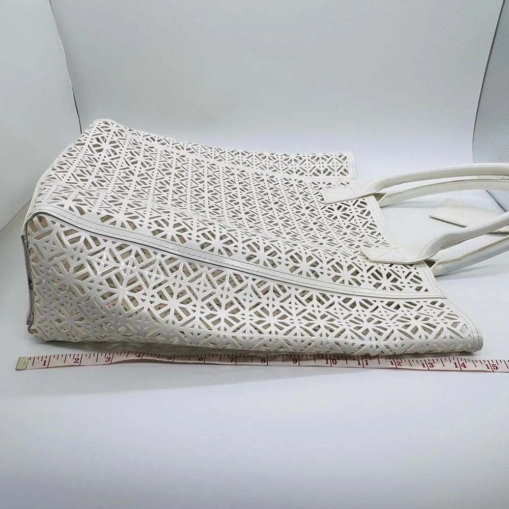 Tory Burch white geometric laser cut out tote bag